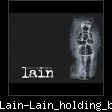 Lain-Lain_holding_book.jpg